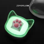 ZOMOPLUS Kitty Paw Keycap provides a soft, bouncy feel and the white-pink kitty paw version comes with a matching glow-in-the-dark storage box.