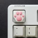 This novelty ZOMOPLUS White-Pink Kitty Paw Keycap adds a playful and unique touch to your keyboard, making it truly one of a kind and compatible with MX switches.