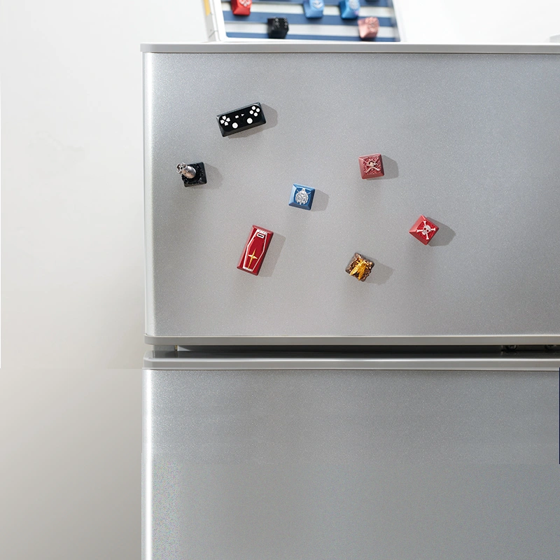 Showcase the keycaps on a refrigerator or other magnetic surfaces using included magnetic adapters.