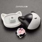 Tuxedo Cat Paw Artisan Keycap by ZOMOPLUS alongside a cute storage box, perfect for a personalized gift for cat lovers.