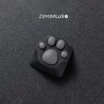 Zoomed-in view of the ZOMOPLUS kitty paw keycap, showcasing its artistry and the fun factor it brings to typing.