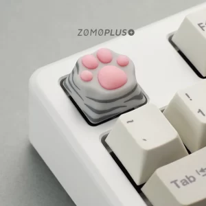 ZOMOPLUS American Shorthair kitty paw keycap installed on ESC key, highlighting its compatibility with MX switches and bouncy silicone feel.