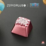 ZOMOPLUS Chopper Keycap side detail, revealing characterful engravings on a sturdy metal finish for long-lasting use.