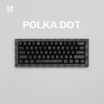 Top-down view of a keyboard featuring the SINOKEY Black Polka Dot Keycap Set, showcasing its clean and minimal design.