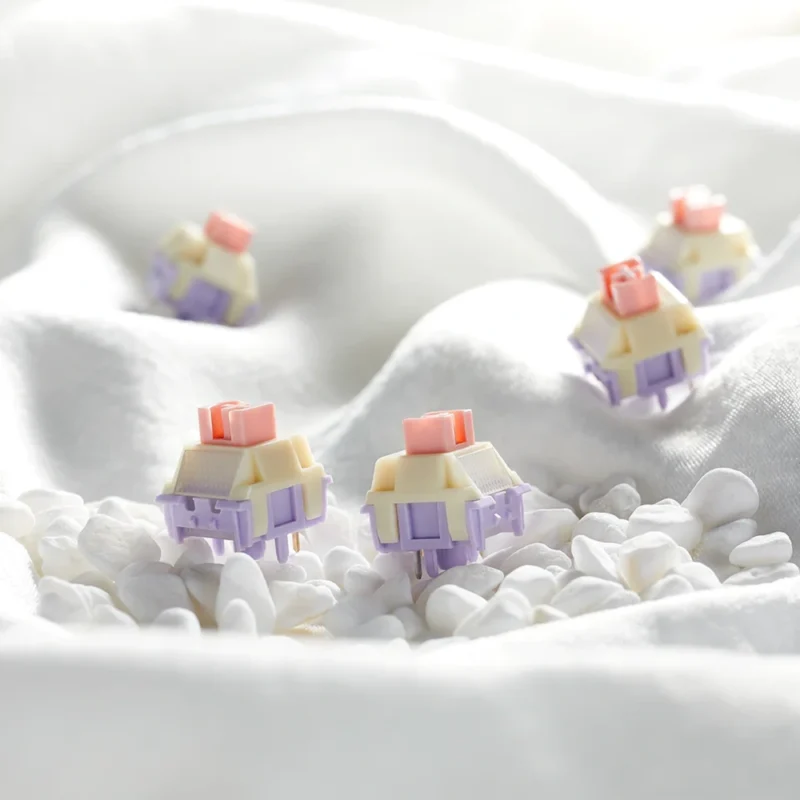 Ultra-light 32g Kailh x Ainbell Belle mechanical keyboard linear switches in soft pastel color