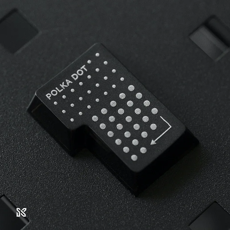 SINOKEY Polka Dot Single Keycap - Macro Detail View with Frosted PC Material Single black polka dot keycap close-up showing frosted PC material texture and precise dot pattern craftsmanship