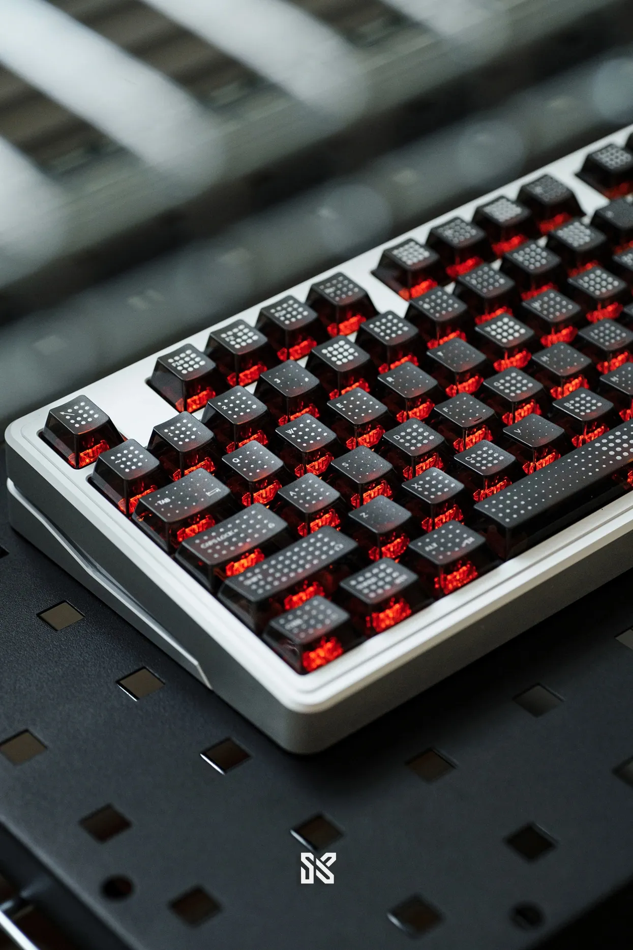 SINOKEY Polka Dot PC Backlit Keycap Set – Black Side angle view of SINOKEY polka dot PC backlit keycap set on white keyboard with red RGB lighting effects
